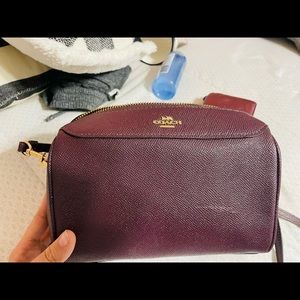 Maroon Coach crossbody purse and matching wallet